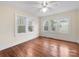 Charming bedroom filled with natural light and gleaming hardwood floors at 2132 Chesterfield Ave, Charlotte, NC 28205