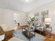 Cozy living room with hardwood floors, natural light, and a view into adjacent rooms at 2132 Chesterfield Ave, Charlotte, NC 28205