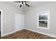 Cozy bedroom with wood-look floors, a ceiling fan and a closet near the door at 2364 Valley Meadows Dr, York, SC 29745