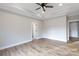 Spacious, bright bedroom featuring trey ceiling, wood-look flooring, and a ceiling fan at 2364 Valley Meadows Dr, York, SC 29745