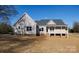 Rear exterior view showcasing a porch and spacious yard at 2364 Valley Meadows Dr, York, SC 29745