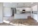 Open kitchen featuring an island with granite countertops, white cabinets, and stainless steel appliances at 2364 Valley Meadows Dr, York, SC 29745