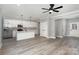 Bright and airy open-concept kitchen featuring stainless steel appliances, an island, and sleek, modern cabinetry at 2365 Kool Park Ne Rd, Hickory, NC 28601