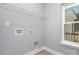 Laundry room with gray walls, vinyl flooring, and hook-ups available at 2365 Kool Park Ne Rd, Hickory, NC 28601