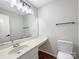 Clean and simple bathroom with a vanity and toilet at 2650 Whisper Ridge Ln, Matthews, NC 28105