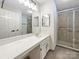Clean bathroom with a large vanity, mirror, and shower at 2650 Whisper Ridge Ln, Matthews, NC 28105