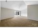 Spacious bedroom with carpeting, bay window, and ceiling fan at 2650 Whisper Ridge Ln, Matthews, NC 28105