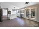 Modern kitchen with white cabinets, island, and stainless steel appliances at 2650 Whisper Ridge Ln, Matthews, NC 28105