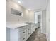 Basement laundry room with white cabinets and a utility sink at 2650 Whisper Ridge Ln, Matthews, NC 28105