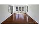 Living room with hardwood floors and bay window at 2650 Whisper Ridge Ln, Matthews, NC 28105