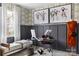 Stylish home office featuring a glass desk, modern decor, and a comfortable daybed near a bright window at 4114 Lattistep Ln, Charlotte, NC 28269
