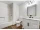 Bathroom featuring modern vanity, toilet, and walk-in shower at 4125 Rivendell Ln, Mint Hill, NC 28227