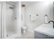 Bright bathroom featuring walk-in shower with white fixtures, toilet, and vanity at 4125 Rivendell Ln, Mint Hill, NC 28227
