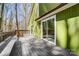 Back deck with chairs and sliding glass door at 4125 Rivendell Ln, Mint Hill, NC 28227