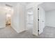 Bright hallway leading to bedroom and bathroom at 4125 Rivendell Ln, Mint Hill, NC 28227