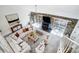 Open living area with stone fireplace, ceiling fan and carpeted floors at 4125 Rivendell Ln, Mint Hill, NC 28227