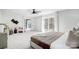 Large, sunlit main bedroom with access to a private deck through sliding glass doors at 4125 Rivendell Ln, Mint Hill, NC 28227