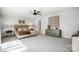 Spacious main bedroom with neutral tones, a ceiling fan, and contemporary furnishings at 4125 Rivendell Ln, Mint Hill, NC 28227