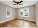 Spacious bedroom with hardwood floors and neutral walls at 415 N Fifth St, Albemarle, NC 28001