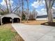 Spacious driveway with detached garage and workshop at 415 N Fifth St, Albemarle, NC 28001