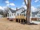 Side view of the house with deck and landscaping at 415 N Fifth St, Albemarle, NC 28001