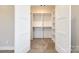 Spacious closet with installed shelves and carpet flooring at 4602 Parkwood School Rd, Monroe, NC 28112