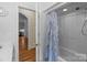 Bathroom with shower-tub combo and a view into the entryway at 47997 Wagoner Rd, Richfield, NC 28137