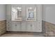 Primary bathroom featuring double sink vanity with white cabinets, stone countertops, and plenty of storage at 47997 Wagoner Rd, Richfield, NC 28137