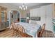 Dining room with chandelier, molding, and arched doorway at 47997 Wagoner Rd, Richfield, NC 28137