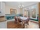 Bright dining room with a large window and traditional wainscoting at 47997 Wagoner Rd, Richfield, NC 28137