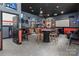 Spacious game room with a movie screen, custom lighting, and Harley Davidson themed decor at 47997 Wagoner Rd, Richfield, NC 28137
