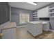Bright office space with custom cabinets, drawers and light hardwood flooring at 47997 Wagoner Rd, Richfield, NC 28137