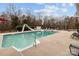 Backyard swimming pool with a slide, lounge chairs, and a well-maintained deck at 47997 Wagoner Rd, Richfield, NC 28137