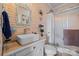 Charming bathroom with a farmhouse sink, rustic wood walls, and walk-in shower at 515 Brawley Rd, Cleveland, NC 27013