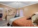 Warm, inviting bedroom featuring soft lighting, a dresser, and a serene atmosphere for restful nights at 515 Brawley Rd, Cleveland, NC 27013