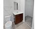 Clean bathroom with vanity, toilet and walk-in closet at 6324 Cutwater Cir, Charlotte, NC 28269