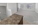 Open concept kitchen with granite countertops and breakfast bar at 6324 Cutwater Cir, Charlotte, NC 28269