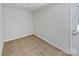 Small laundry room with neutral walls and tiled flooring at 6324 Cutwater Cir, Charlotte, NC 28269