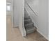 Gray carpeted staircase leading to the upper level at 6324 Cutwater Cir, Charlotte, NC 28269