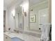 Bathroom featuring custom mirrors, marble countertops and fixtures at 641 Museum Dr, Charlotte, NC 28207