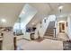Bright home office featuring a built-in desk, window seat, and easy access to the staircase at 641 Museum Dr, Charlotte, NC 28207