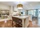 Gourmet kitchen with marble island, modern appliances, and hardwood floors at 641 Museum Dr, Charlotte, NC 28207