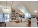 Bright office featuring a built in bookshelf, large desk and windows at 641 Museum Dr, Charlotte, NC 28207
