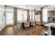 Elegant dining room with large windows and modern lighting at 7020 Loso Commons Way, Charlotte, NC 28217