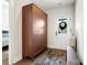 Bright foyer with a storage cabinet and a view of the front door at 7020 Loso Commons Way, Charlotte, NC 28217