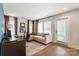 Cozy home office features neutral color scheme, lots of light, and hardwood floors at 7020 Loso Commons Way, Charlotte, NC 28217