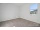 Spacious bedroom with neutral carpeting and window at 821 Hallman Branch Ln, Lincolnton, NC 28092