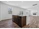 Modern kitchen with island and stainless steel appliances at 821 Hallman Branch Ln, Lincolnton, NC 28092