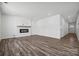 Open living space with hardwood floors and access to the kitchen at 821 Hallman Branch Ln, Lincolnton, NC 28092