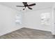 Spacious bedroom with two windows providing natural light and neutral color palette at 913 W Ninth Ave, Gastonia, NC 28052